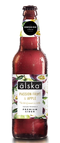 bottle of alska passion fruit & apple cider on plain background
