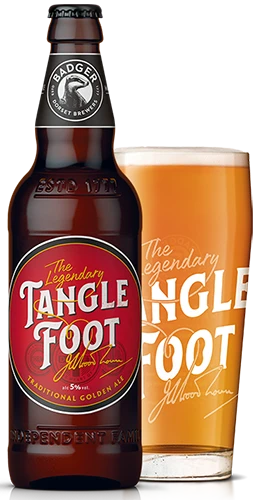 bottle and pint glass filled with badgers tangle foot golden ale on plain background