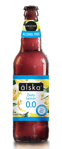 bottle of alska 0% zesty lemon cider on plain background