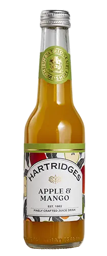 bottle of hartridges apple & mango juice on plain background