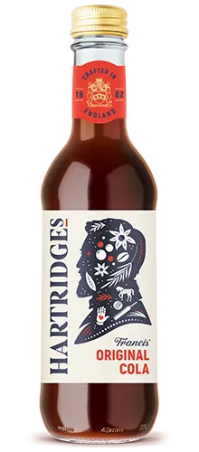 bottle of hartridges original cola on plain background