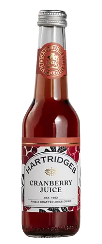 bottle of hartridges cranberry juice on plain background
