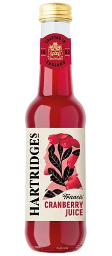 bottle of hartridges cranberry juice on plain background