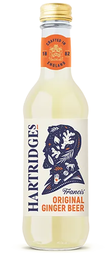 bottle of hartridges ginger beer on plain background