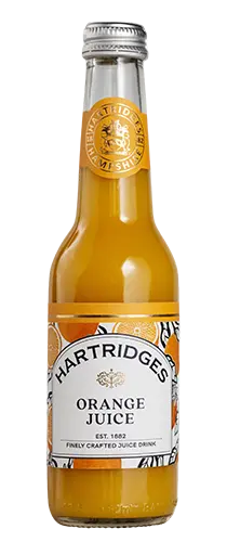bottle of hartridges orange juice on plain background