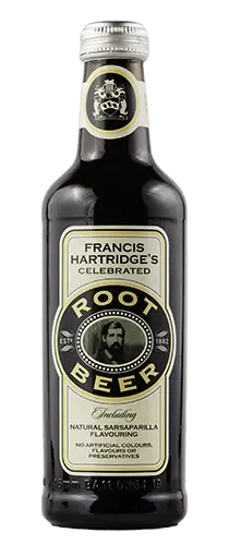 bottle of hartridges root beer on plain background