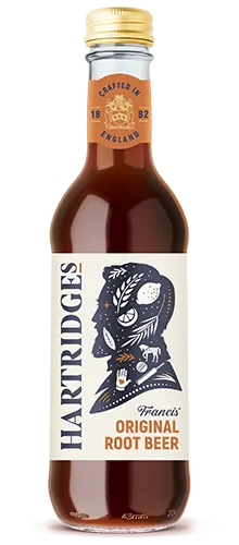 bottle of hartridges root beer on plain background