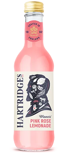 bottle of hartridges rose lemonade on plain background