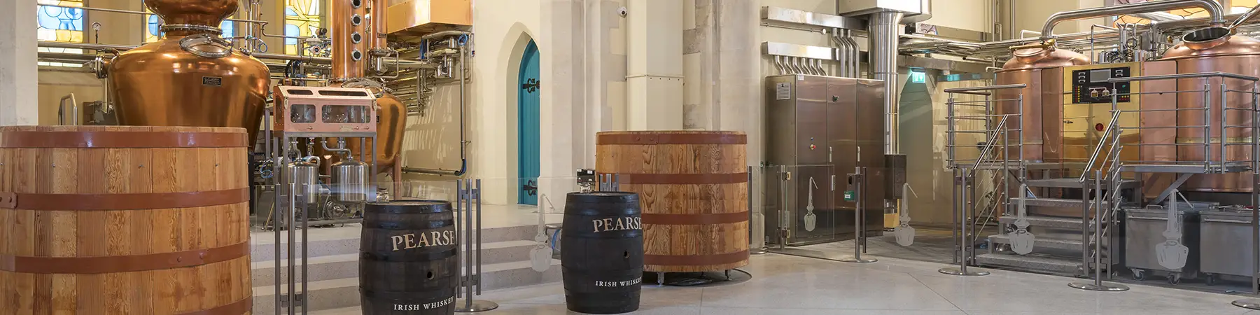 Interior of Pearse Lyons distillery with pots and stills